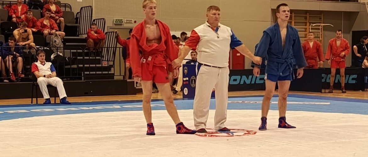 Наш тренер в судейской коллегии.